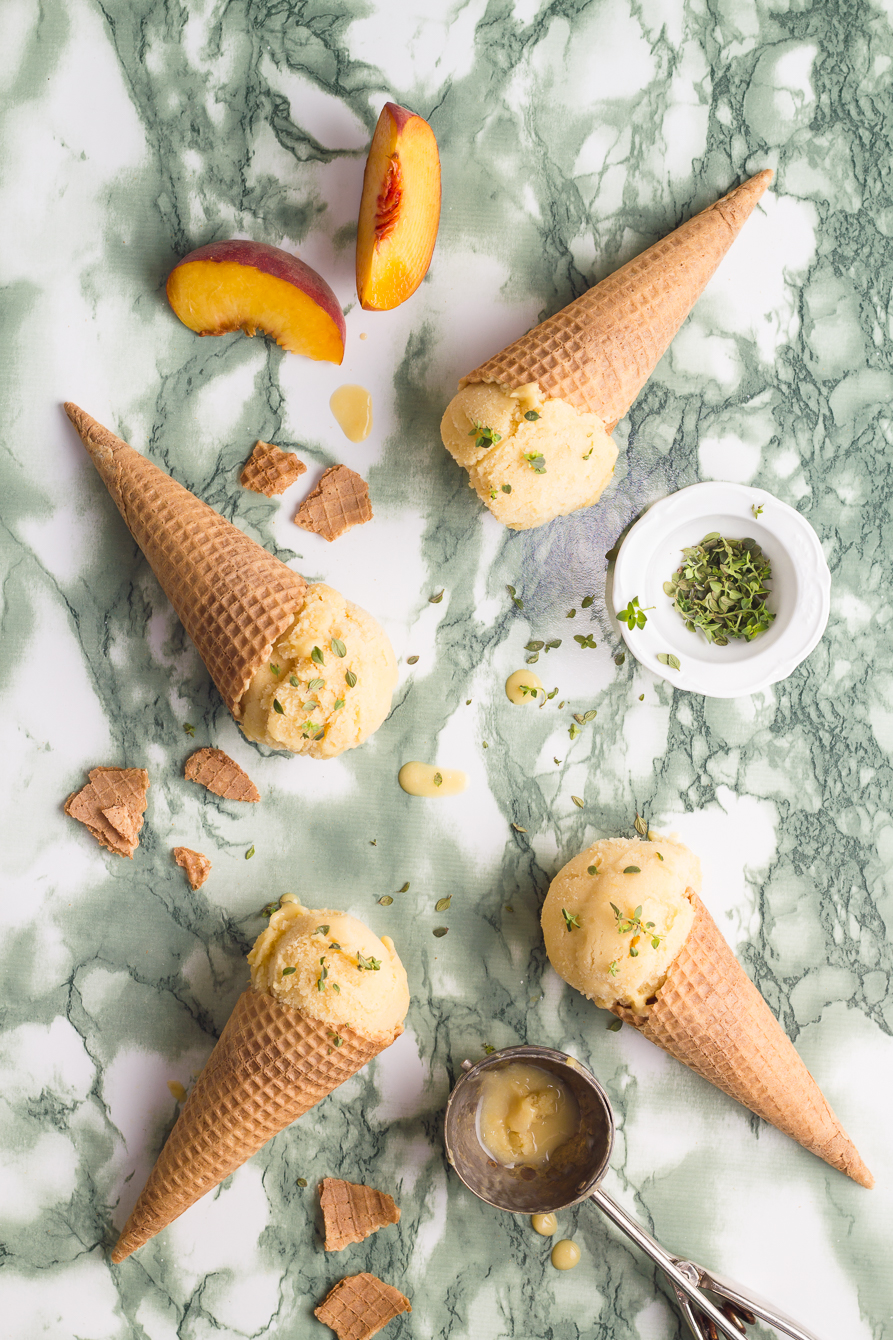 Vegan peach ice cream scented with lemon thyme, sugar & dairy free. It can be easily prepared without an ice cream maker, as well.